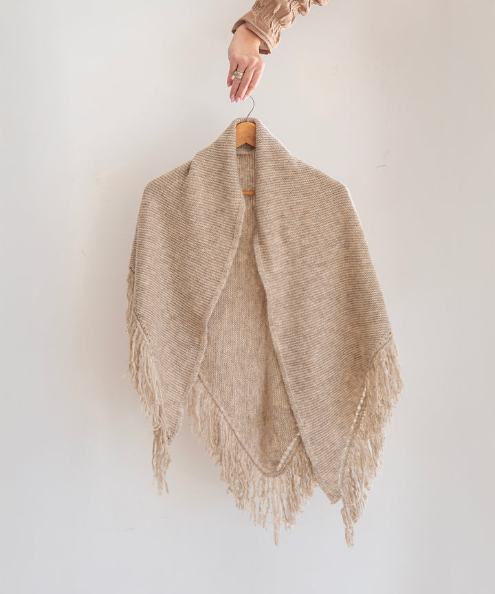 Poncho de flecos